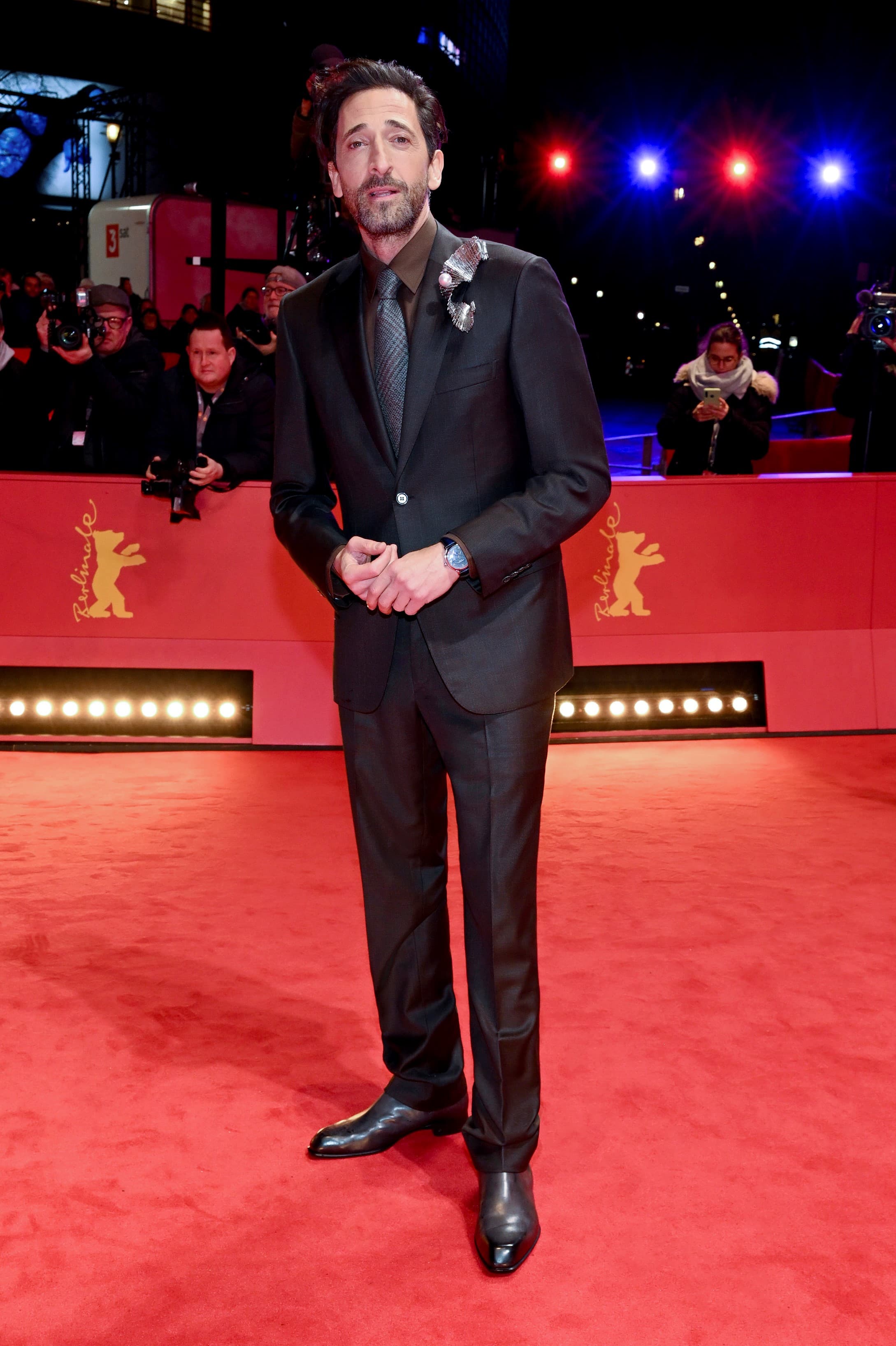 Adrien Brody wearing a Brioni suit